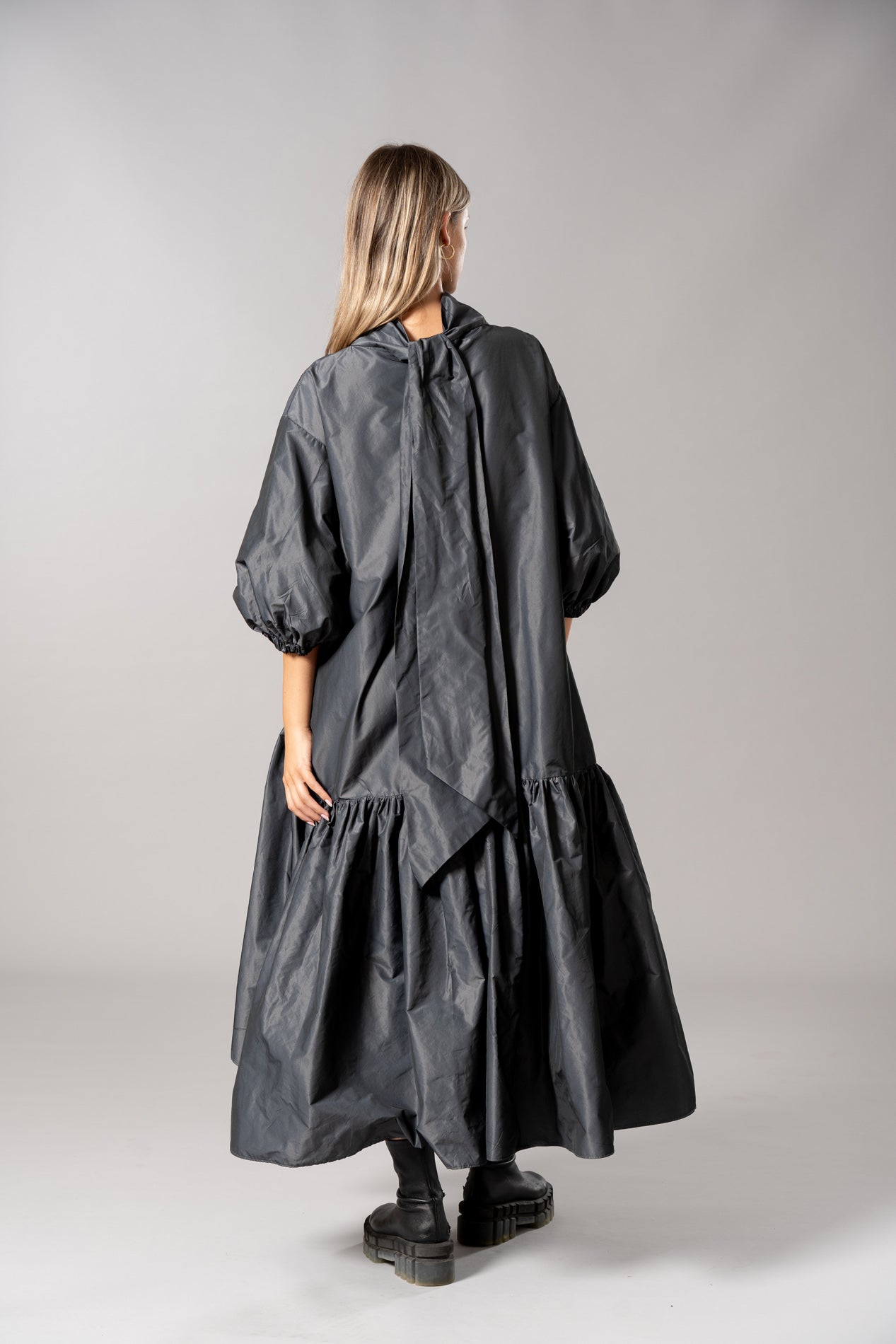 Taffeta Evening Dress with Frill, Ballon Sleeve and high neck and bow detail by Roisin Linnane
